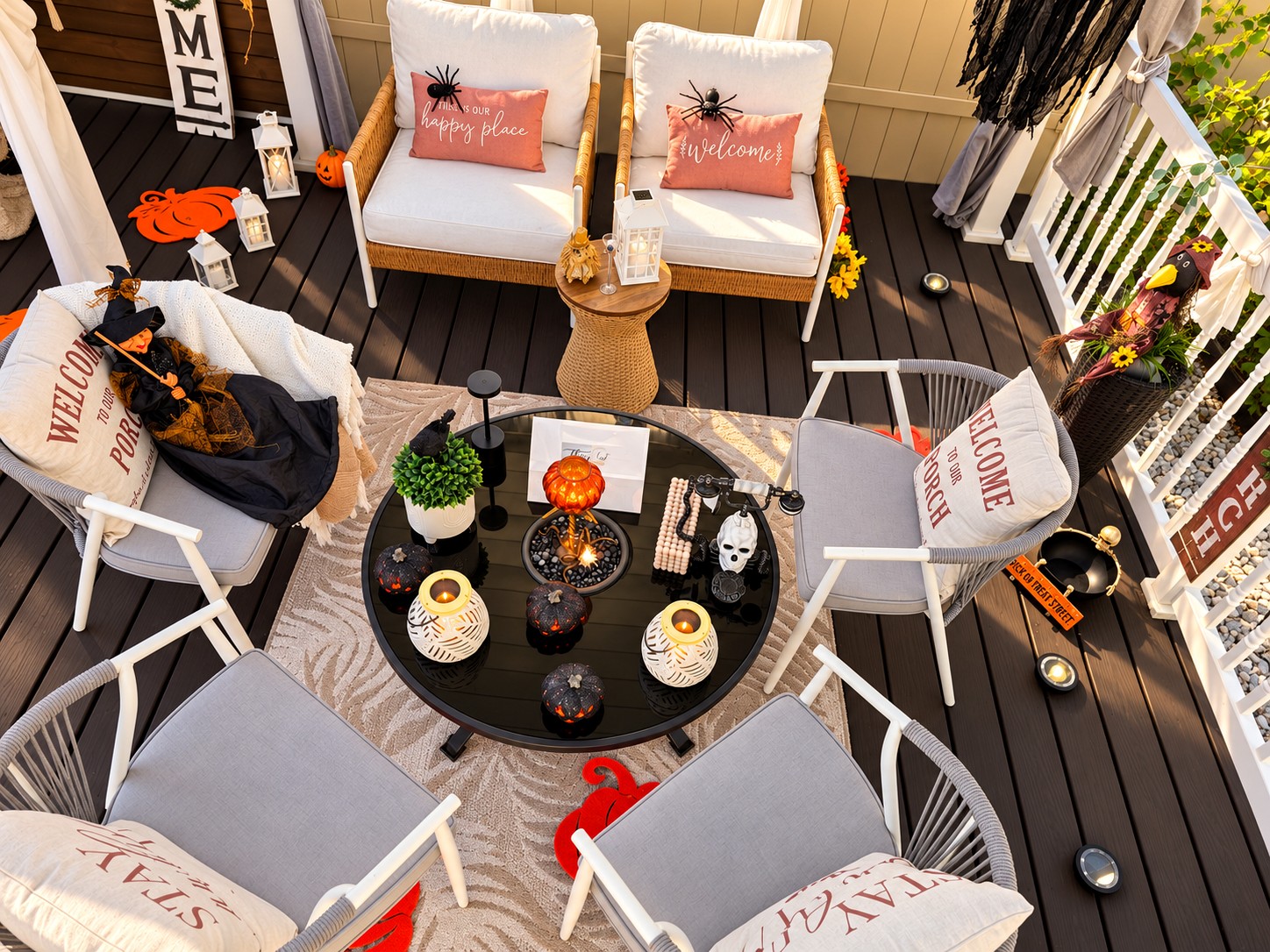 Overhead view of a Halloween-styled patio seating area with pumpkin accents and lanterns