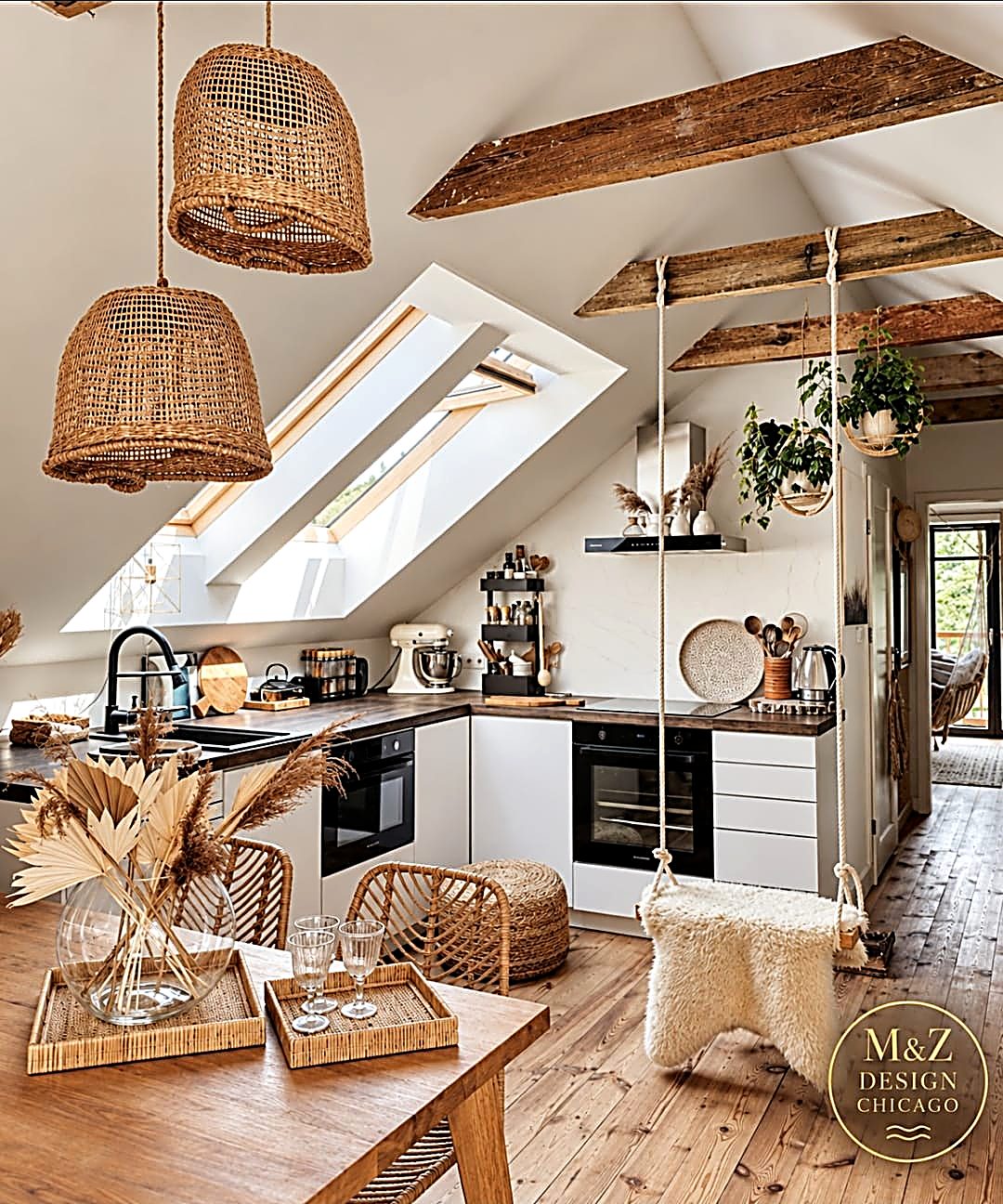 Attic kitchen with exposed beams and rattan pendants, an M&Z design
