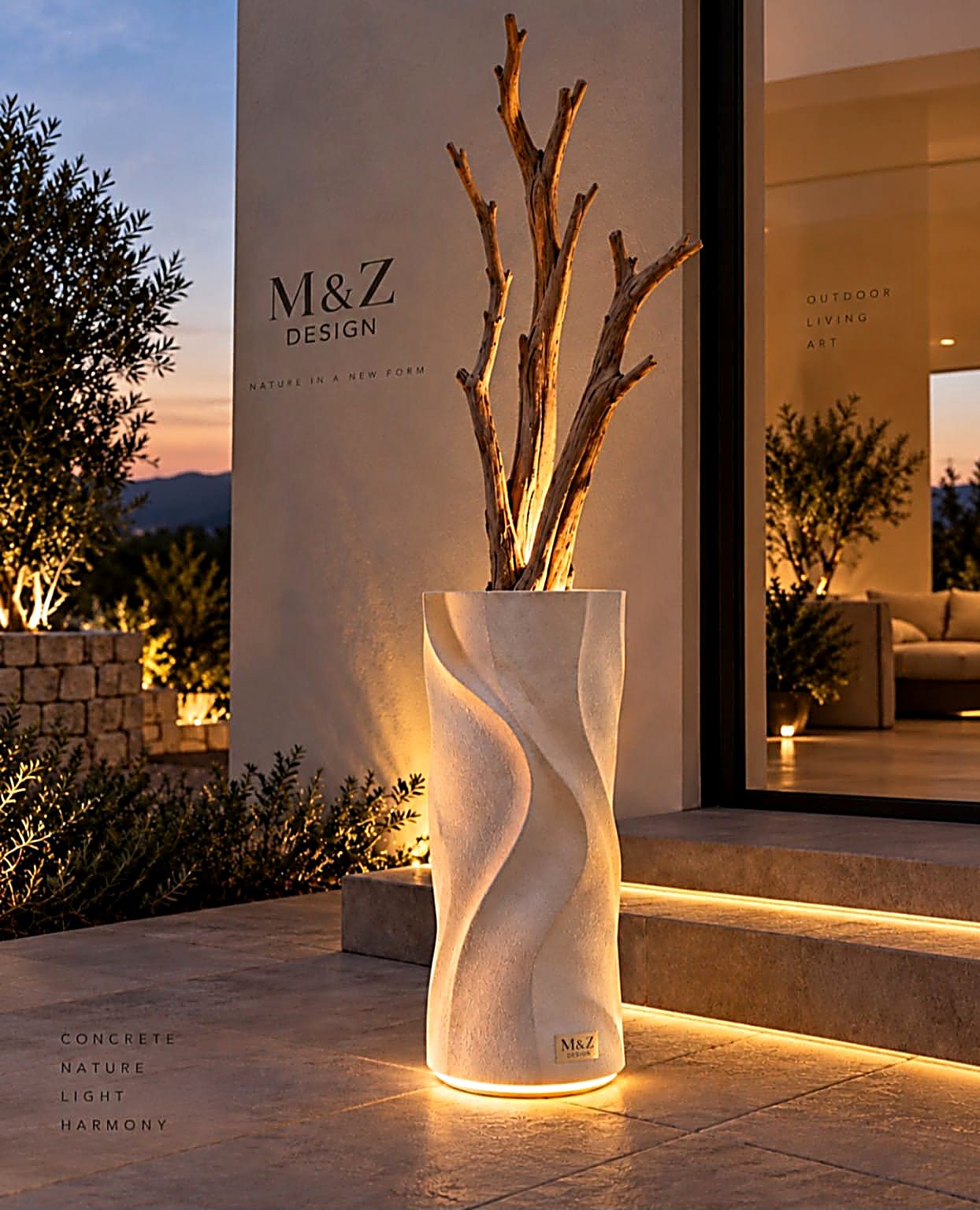 Nature in a New Form — an illuminated carved vessel with natural branches at an M&Z-designed entrance